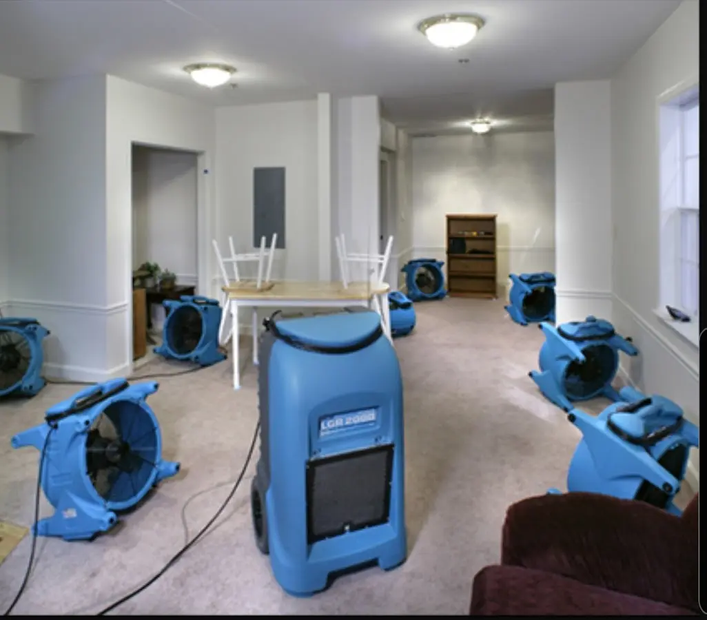 Air movers and dehumidifier setup for Water Damage Restoration in Wildwood